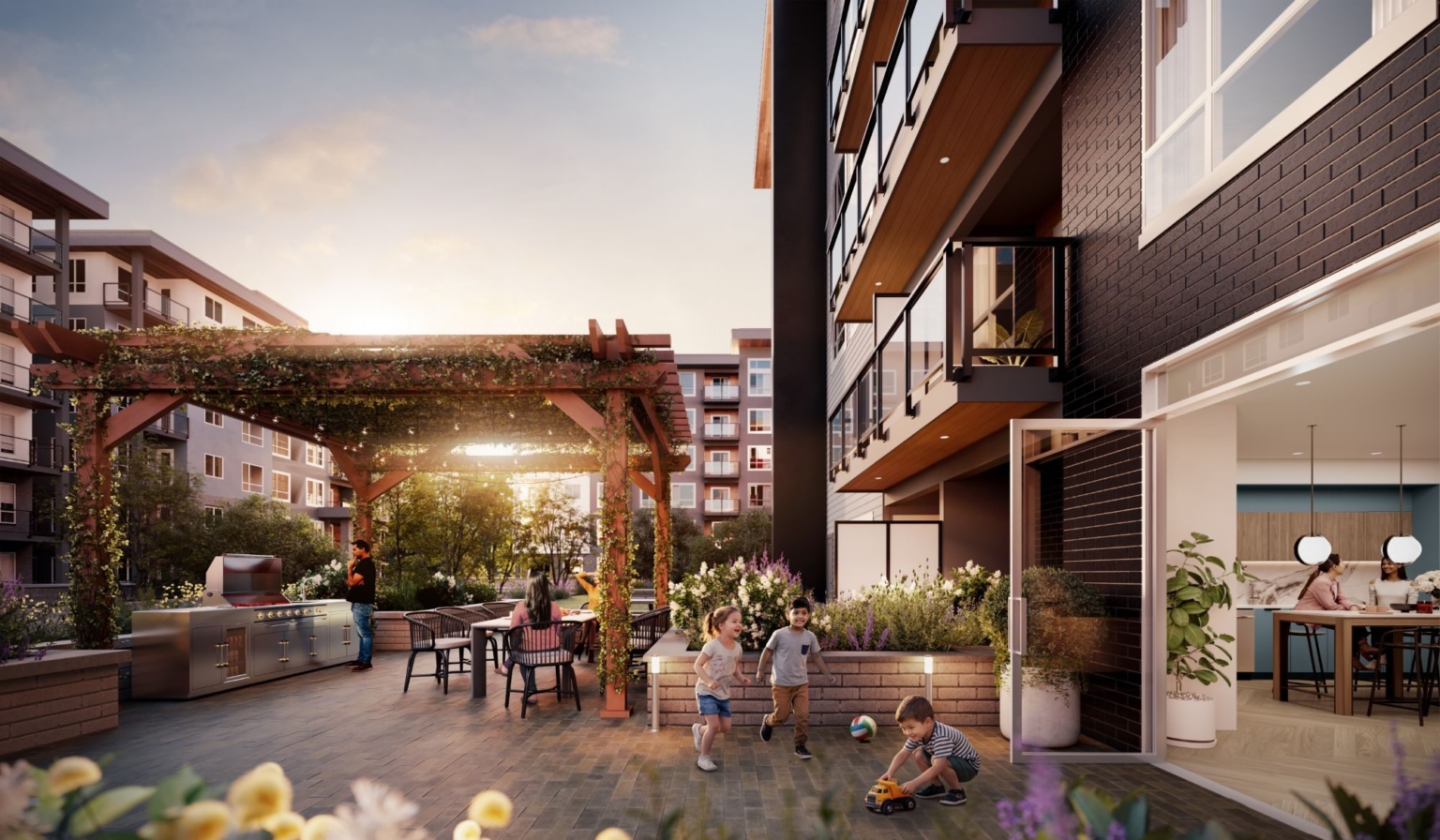Outdoor kitchen and dining under the pergola at The Nest