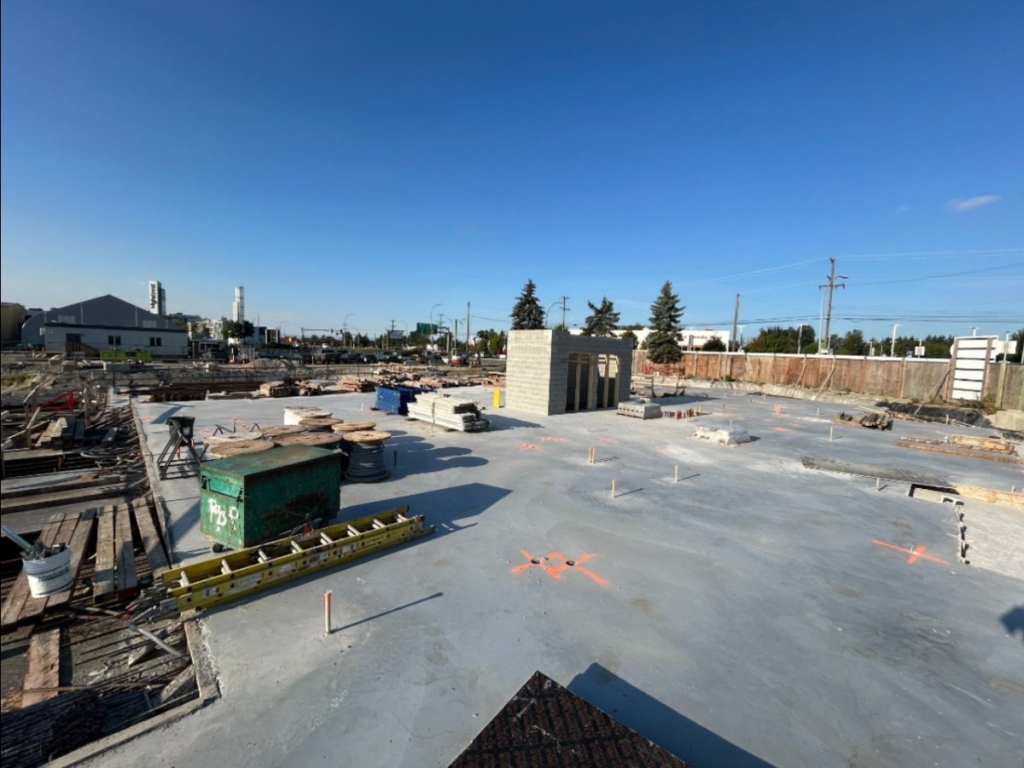 West grade slab poured and stripped, Buildings 3 and 4